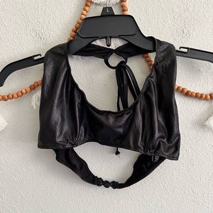Exposed black faux leather bikini top